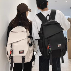 CaringKleing背包男初中生轻便防水双肩包日系百搭高中生书包女潮